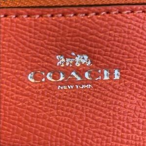 Coach Accessories - NWOT Coral Coach Wristlet